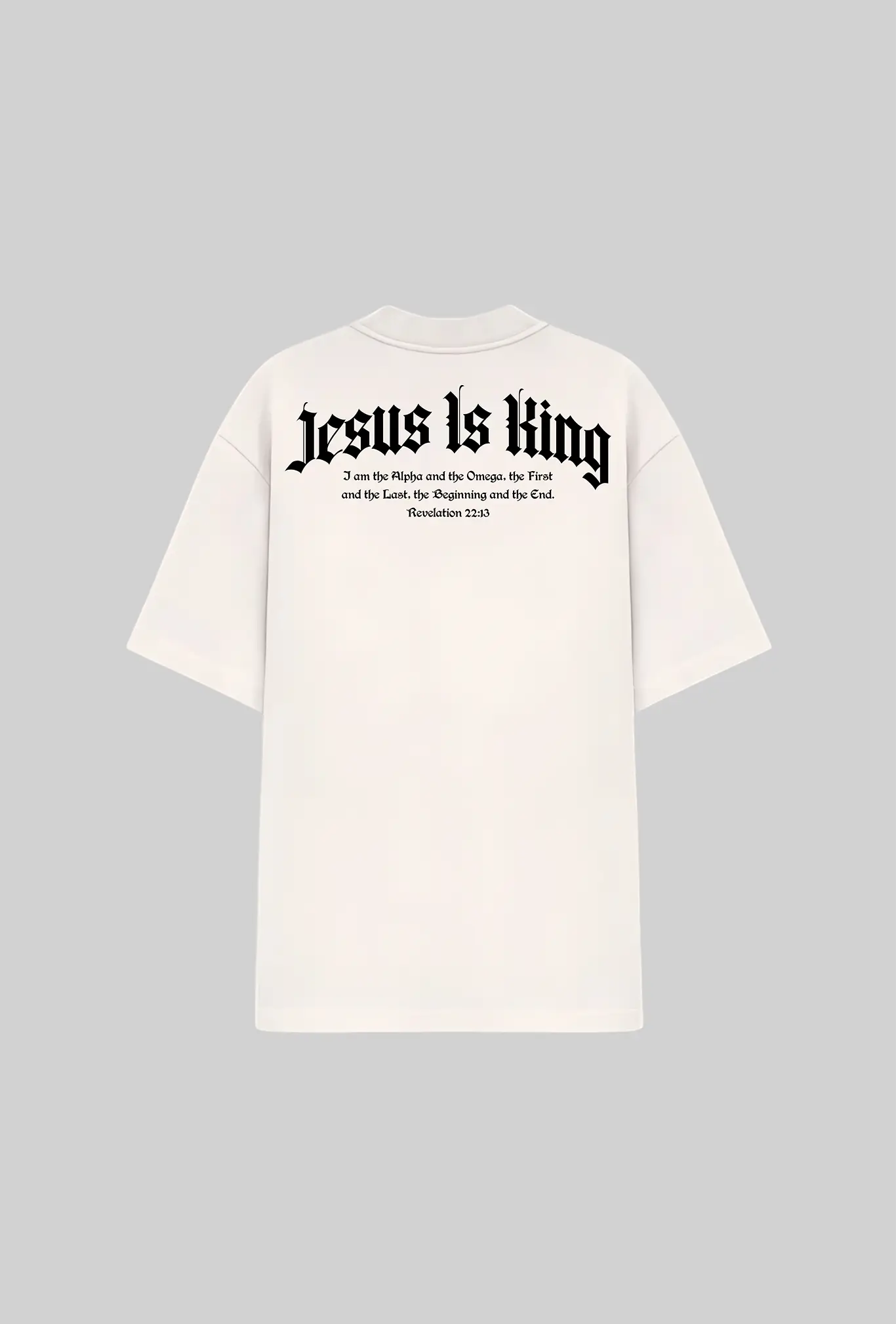 Camiseta oversized Jesus Is King GLORYFIT off white vista traseira com estampa em fundo cinza