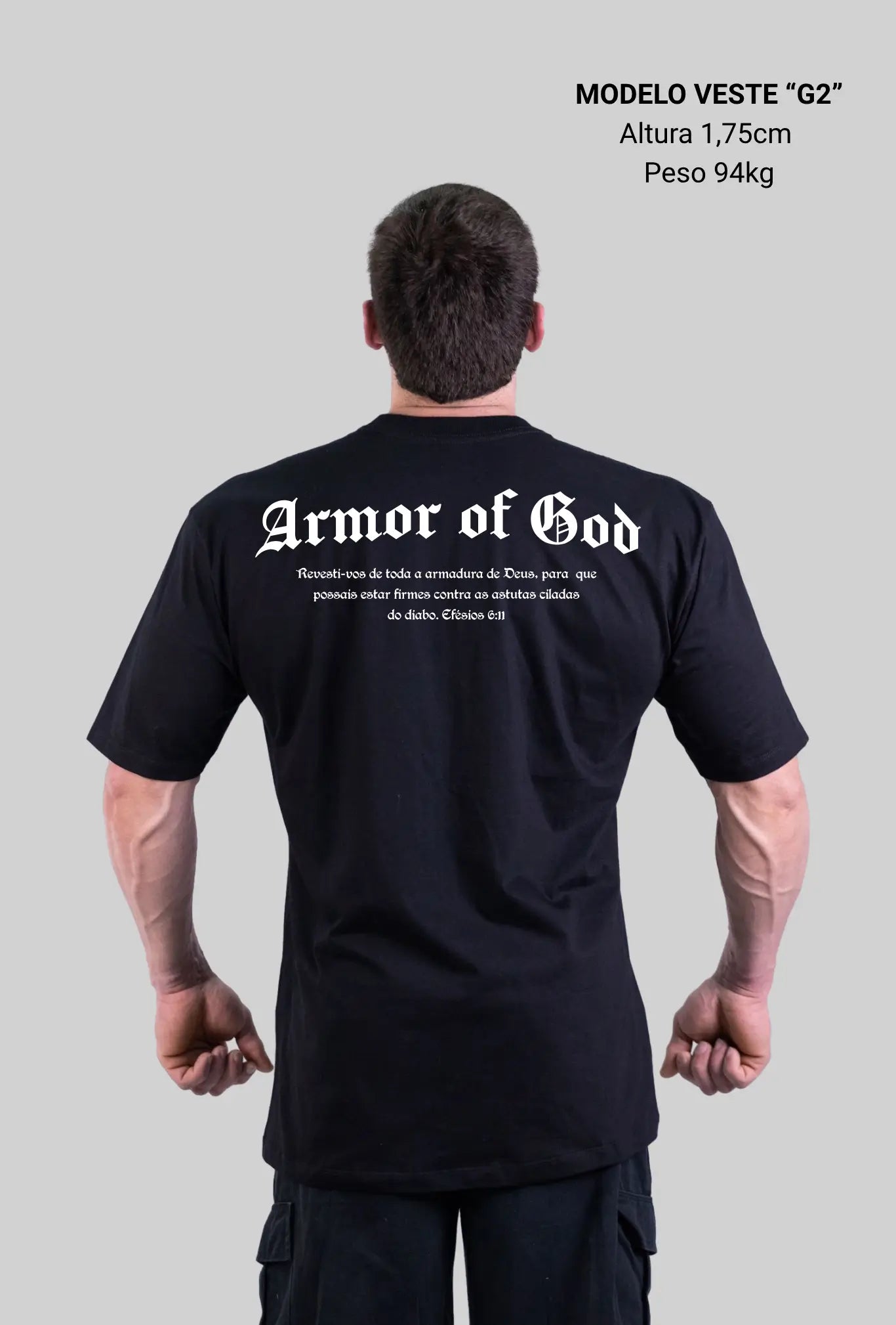 Camiseta oversized Armor of God GLORYFIT preta vista traseira com fundo cinza