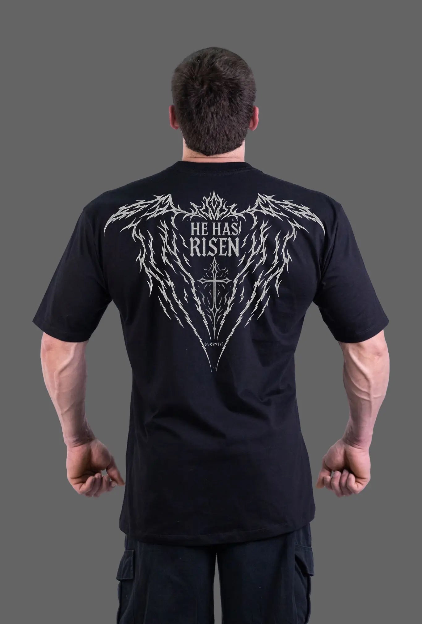 Camiseta oversized premium GLORYFIT preta com estampa “He Has Risen” nas costas