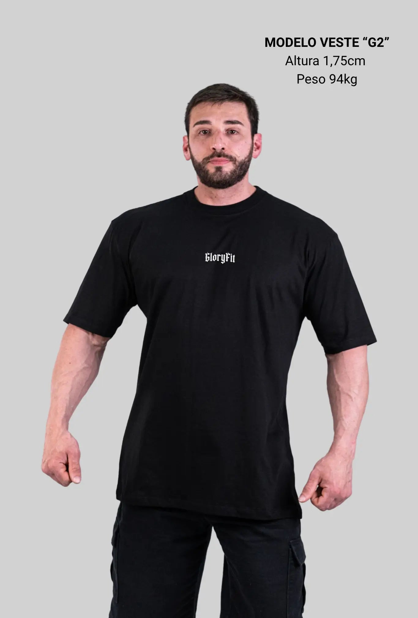 Camiseta oversized Proverbs GLORYFIT preta vista frontal com fundo cinza