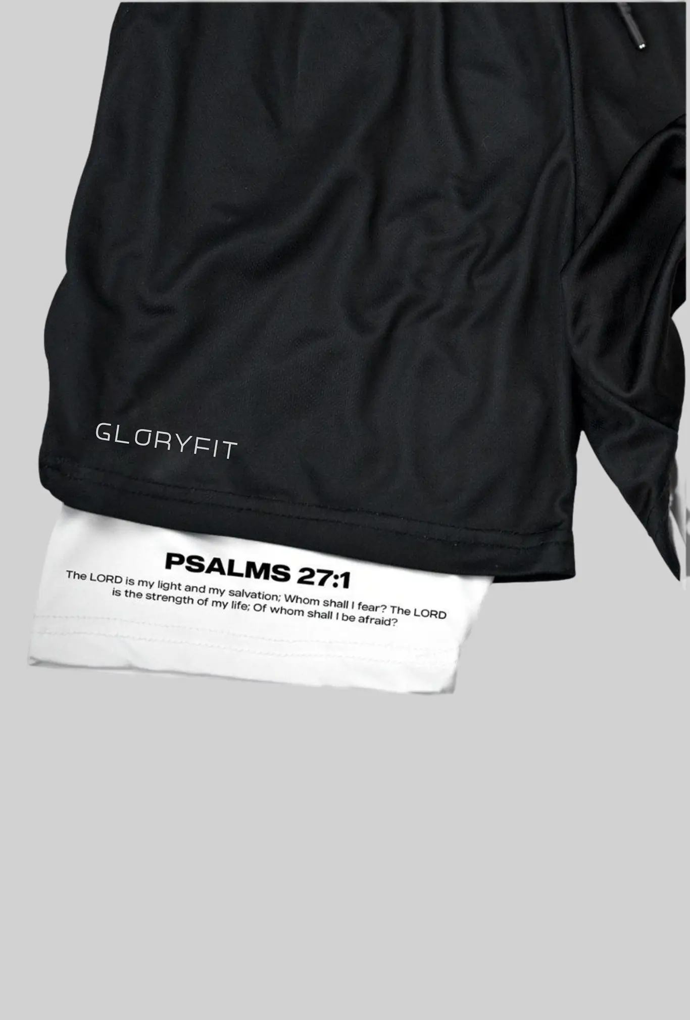 Shorts 2 em 1 GLORYFIT Salmos 27:1 mostrando detalhe do tecido e acabamento